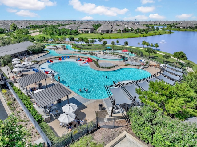30622 Indigo Falls Dr, Brookshire, TX 77423 - community pool featuring a water view, fence, and a patio area