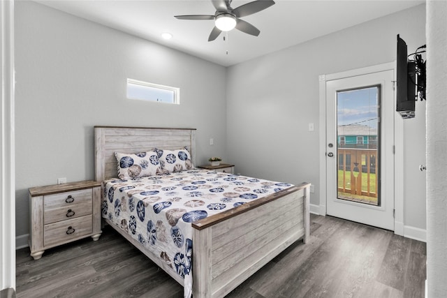 206 San Luis Blvd, Freeport, TX 77541 - bedroom with access to outside, dark wood-type flooring, and a ceiling fan