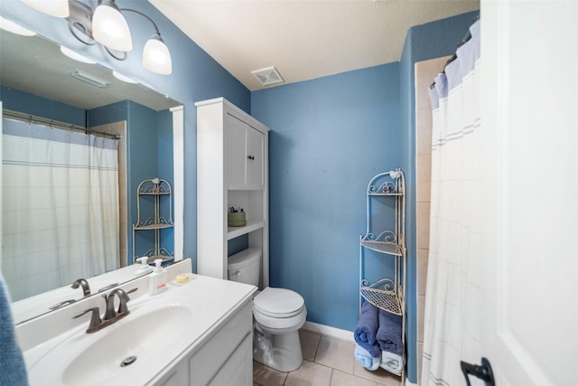2510 Eagle Post Dr, Conroe, TX 77304 - bathroom featuring toilet, tile patterned flooring, and vanity
