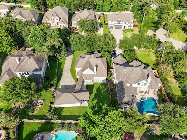 2510 Eagle Post Dr, Conroe, TX 77304 - aerial perspective of suburban area with a pool