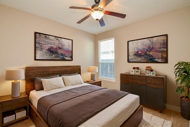 705 Seydler St, East Bernard, TX 77435 - bedroom featuring light carpet, a ceiling fan, and baseboards