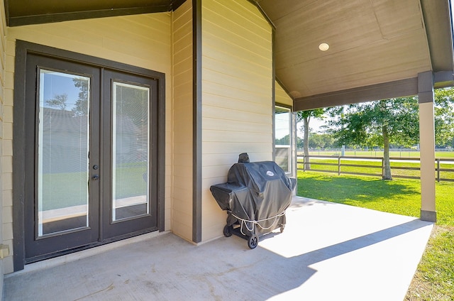 705 Seydler St, East Bernard, TX 77435 - view of patio featuring french doors and a grill