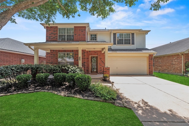 10826 Redstone Ct, Missouri City, TX 77459 - traditional-style house with brick siding, a garage, driveway, and a front lawn