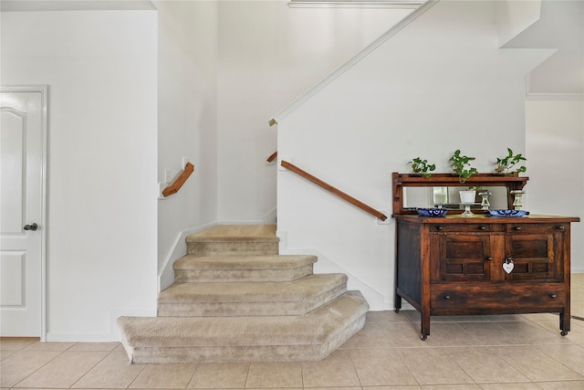 10826 Redstone Ct, Missouri City, TX 77459 - staircase featuring tile patterned floors and baseboards