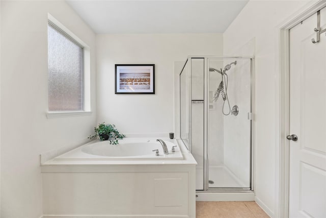 10826 Redstone Ct, Missouri City, TX 77459 - full bathroom with a shower stall, a garden tub, and tile patterned flooring