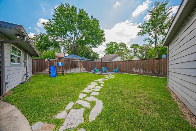 view of yard with a playground