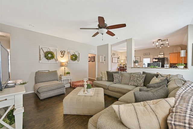 2910 Meridian Bay Ln, Dickinson, TX 77539 - living room featuring ceiling fan and dark wood-style floors