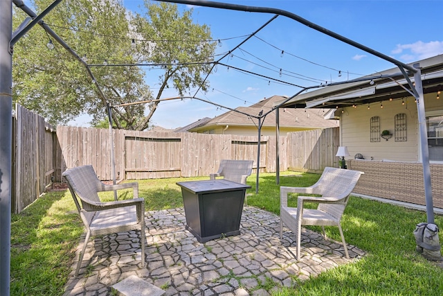 2910 Meridian Bay Ln, Dickinson, TX 77539 - view of patio / terrace with an outdoor fire pit