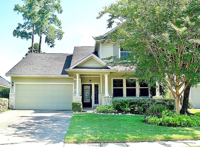 15238 Ledgewood Park Dr, Cypress, TX 77429 - craftsman inspired home featuring an attached garage, a front lawn, driveway, and roof with shingles