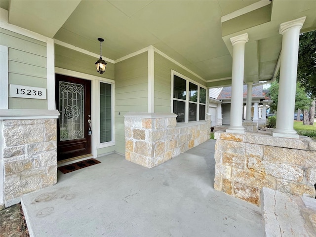 15238 Ledgewood Park Dr, Cypress, TX 77429 - doorway to property featuring a porch and stone siding
