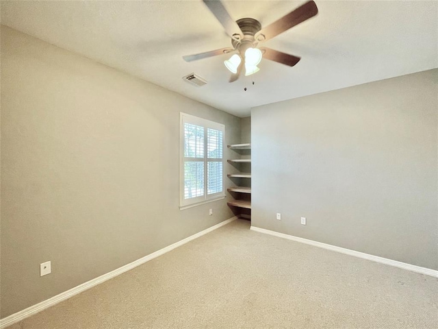 15238 Ledgewood Park Dr, Cypress, TX 77429 - spare room with a ceiling fan, light carpet, and baseboards
