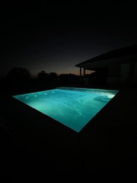 1463 Mountain Valley Dr, Concan, TX 78838 - view of pool at night
