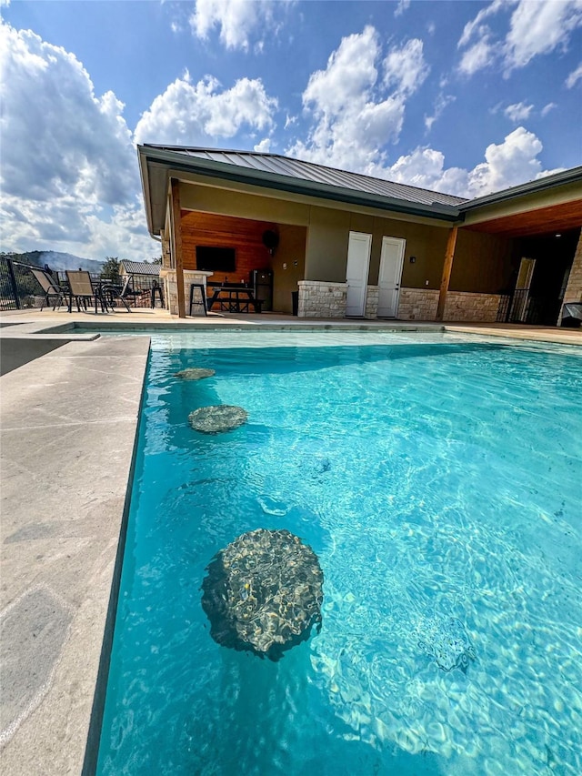 1463 Mountain Valley Dr, Concan, TX 78838 - swimming pool with a patio area and fence