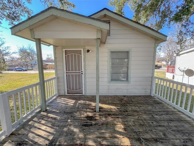 1600 Ash St, Baytown, TX 77520 - view of front of home with a wooden deck