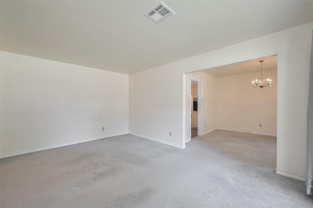 7827 Braesdale Ln, Houston, TX 77071 - unfurnished room with a chandelier, light colored carpet, and baseboards