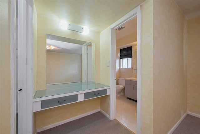 7827 Braesdale Ln, Houston, TX 77071 - bathroom featuring vanity, toilet, and baseboards