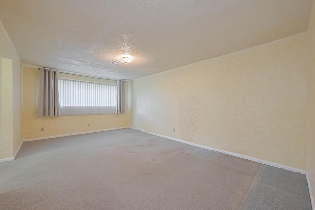 7827 Braesdale Ln, Houston, TX 77071 - carpeted spare room featuring baseboards and a textured ceiling