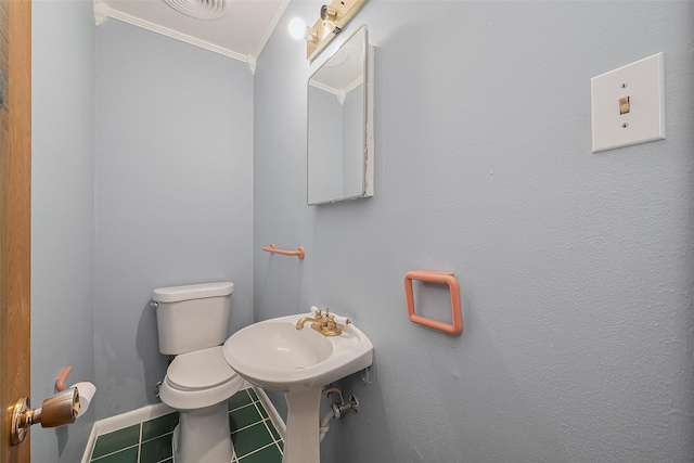 7827 Braesdale Ln, Houston, TX 77071 - bathroom with ornamental molding, tile patterned floors, toilet, and baseboards
