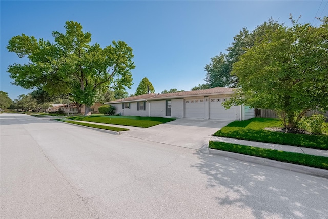 7827 Braesdale Ln, Houston, TX 77071 - ranch-style house with an attached garage and driveway