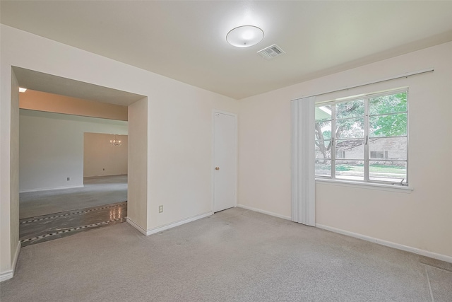 7827 Braesdale Ln, Houston, TX 77071 - unfurnished room with light colored carpet, plenty of natural light, and baseboards