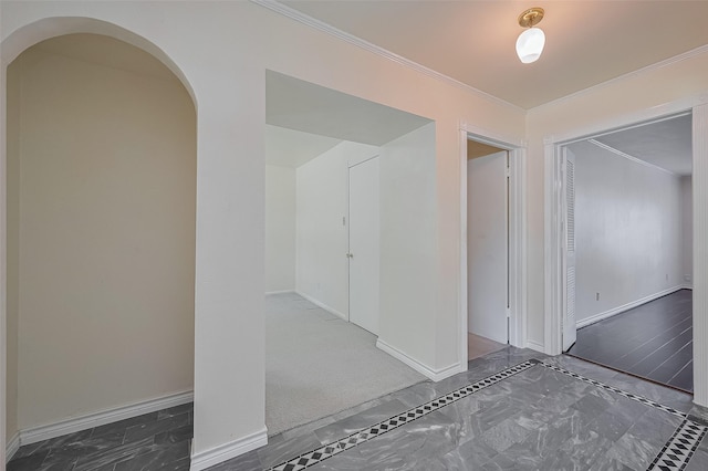 7827 Braesdale Ln, Houston, TX 77071 - unfurnished room featuring crown molding, arched walkways, baseboards, and marble finish floors