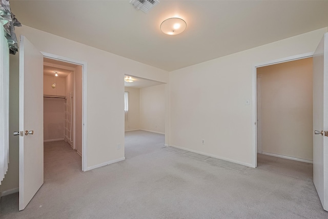 7827 Braesdale Ln, Houston, TX 77071 - spare room featuring light colored carpet and baseboards
