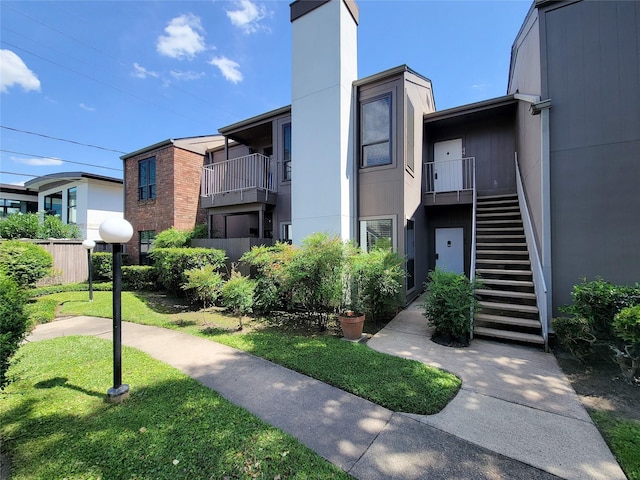 1201 Bering Dr Unit 44, Houston, TX 77057 - view of building exterior featuring stairway