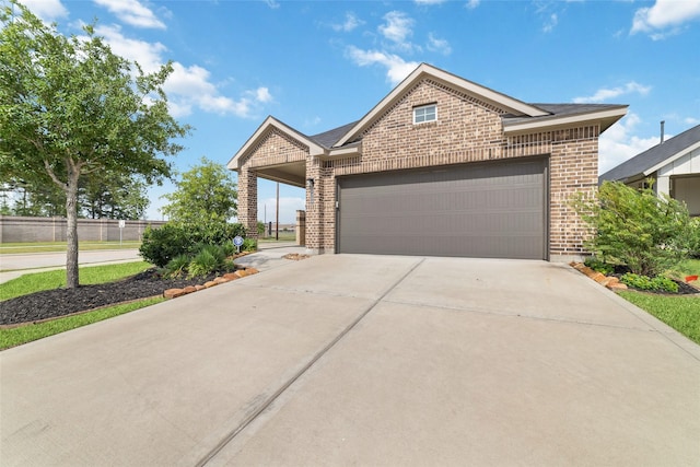 7258 Allendale Arbor Ct, Cypress, TX 77433 - view of front facade featuring brick siding, an attached garage, concrete driveway, and fence