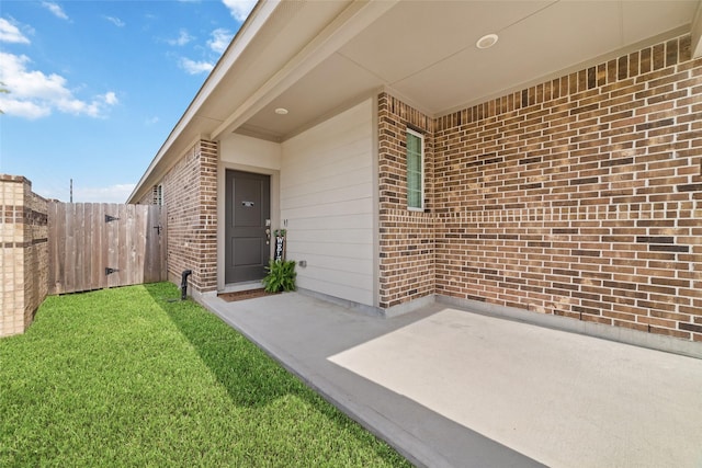 7258 Allendale Arbor Ct, Cypress, TX 77433 - property entrance featuring brick siding and a patio area