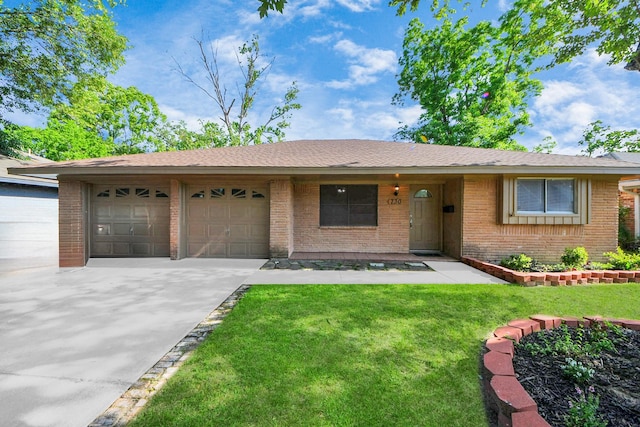730 Columbia Ln, Deer Park, TX 77536 - ranch-style home with a garage, brick siding, concrete driveway, and a front yard