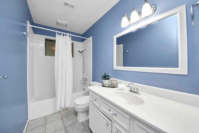 730 Columbia Ln, Deer Park, TX 77536 - full bath featuring shower / tub combo with curtain, vanity, toilet, and tile patterned flooring