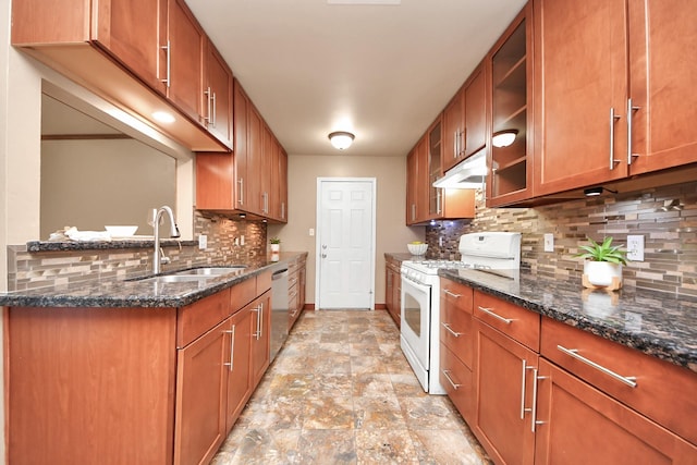 730 Columbia Ln, Deer Park, TX 77536 - kitchen with white gas stove, dishwasher, baseboards, brown cabinets, and stone finish floors