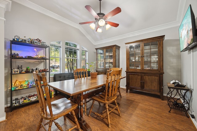 18011 Outback Lakes Trl, Humble, TX 77346 - dining room featuring wood finished floors, a ceiling fan, lofted ceiling, ornamental molding, and baseboards