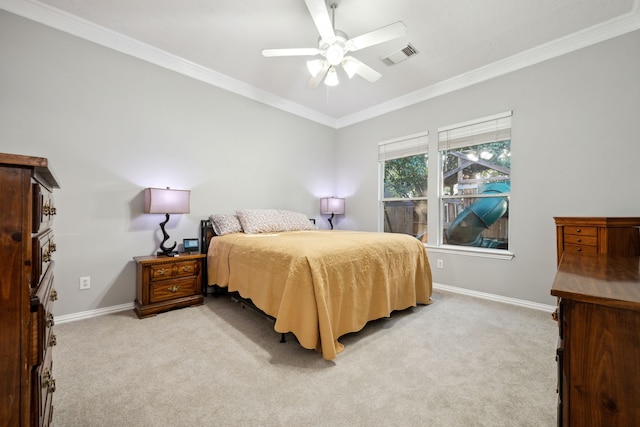 18011 Outback Lakes Trl, Humble, TX 77346 - bedroom with light colored carpet, ornamental molding, baseboards, and a ceiling fan