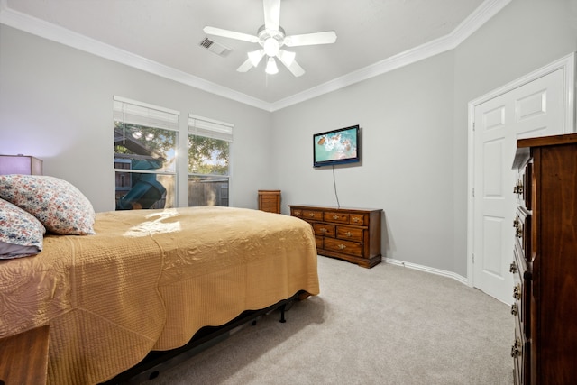 18011 Outback Lakes Trl, Humble, TX 77346 - bedroom with light carpet, crown molding, baseboards, and a ceiling fan