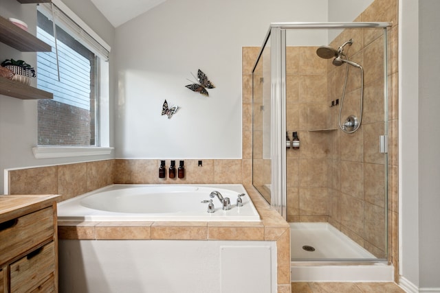 18011 Outback Lakes Trl, Humble, TX 77346 - full bath featuring a shower stall, a garden tub, and vaulted ceiling