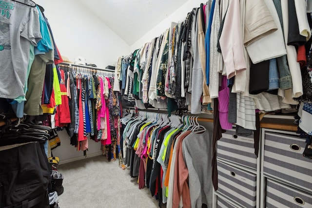 18011 Outback Lakes Trl, Humble, TX 77346 - spacious closet featuring carpet flooring and lofted ceiling