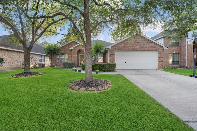 18011 Outback Lakes Trl, Humble, TX 77346 - view of front of home featuring brick siding, an attached garage, concrete driveway, and a front yard