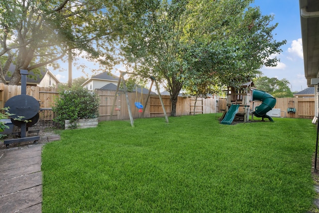 18011 Outback Lakes Trl, Humble, TX 77346 - view of yard featuring a playground