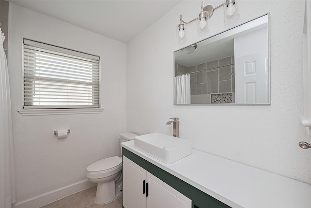 7011 Maple Fox Dr, Humble, TX 77338 - full bath with tile patterned floors, vanity, toilet, curtained shower, and baseboards