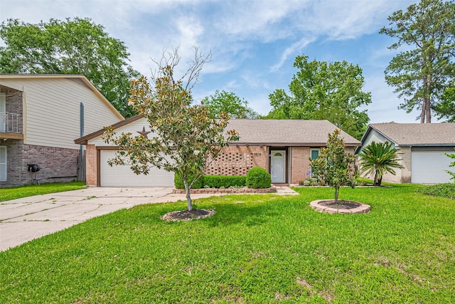 7011 Maple Fox Dr, Humble, TX 77338 - view of front facade with an attached garage, brick siding, driveway, and a front yard