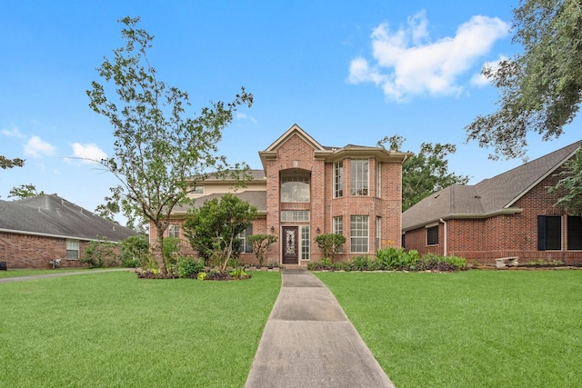 19827 Lajuana Ln, Spring, TX 77388 - view of front facade with brick siding and a front yard