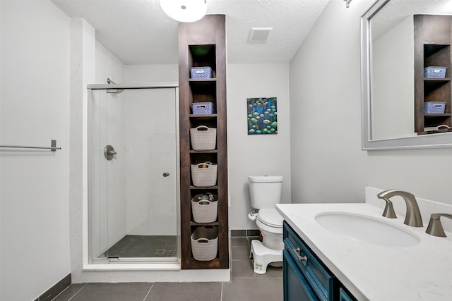 1731 W 22nd St, Houston, TX 77008 - full bath featuring tile patterned floors, a shower stall, vanity, baseboards, and a textured ceiling
