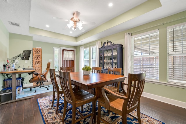 1731 W 22nd St, Houston, TX 77008 - dining space featuring a raised ceiling, healthy amount of natural light, ceiling fan, dark wood-style flooring, and recessed lighting