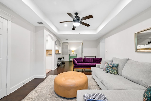1731 W 22nd St, Houston, TX 77008 - living room with a raised ceiling, ceiling fan, wood finished floors, and baseboards