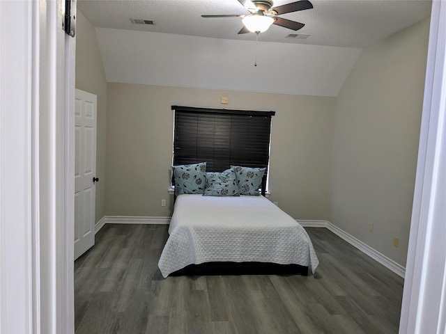 10067 Lazy Meadows Dr, Houston, TX 77064 - bedroom featuring lofted ceiling, wood finished floors, baseboards, and ceiling fan