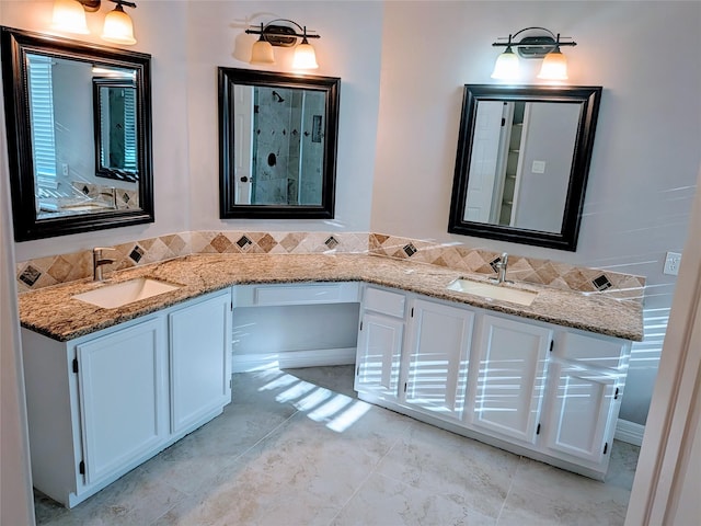 10067 Lazy Meadows Dr, Houston, TX 77064 - bathroom with double vanity and a shower