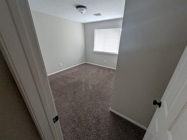 10067 Lazy Meadows Dr, Houston, TX 77064 - carpeted empty room featuring baseboards