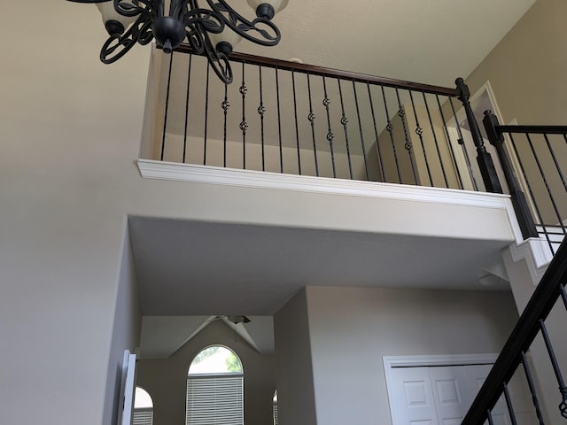 10067 Lazy Meadows Dr, Houston, TX 77064 - staircase featuring a chandelier