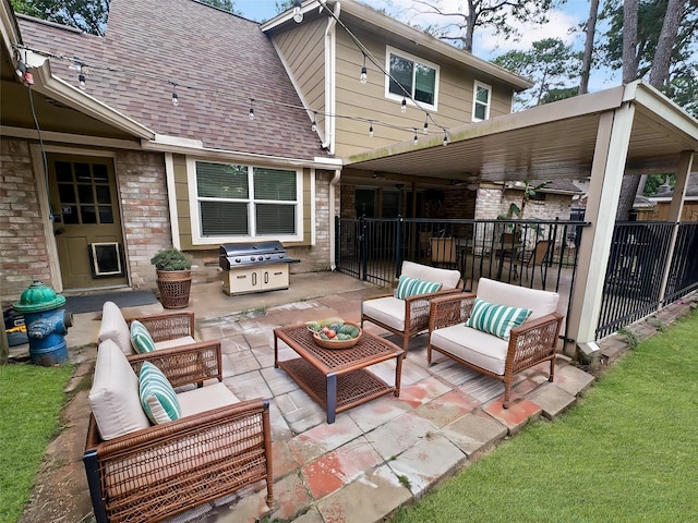 17407 Majestic Forest Dr, Spring, TX 77379 - view of patio / terrace featuring area for grilling and an outdoor hangout area